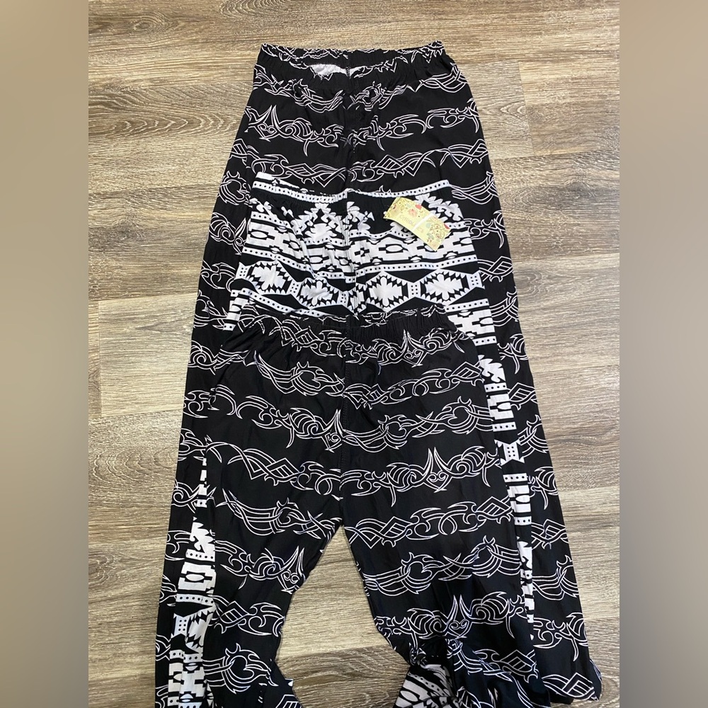 Black and White Striped Leggings with Vertical Text